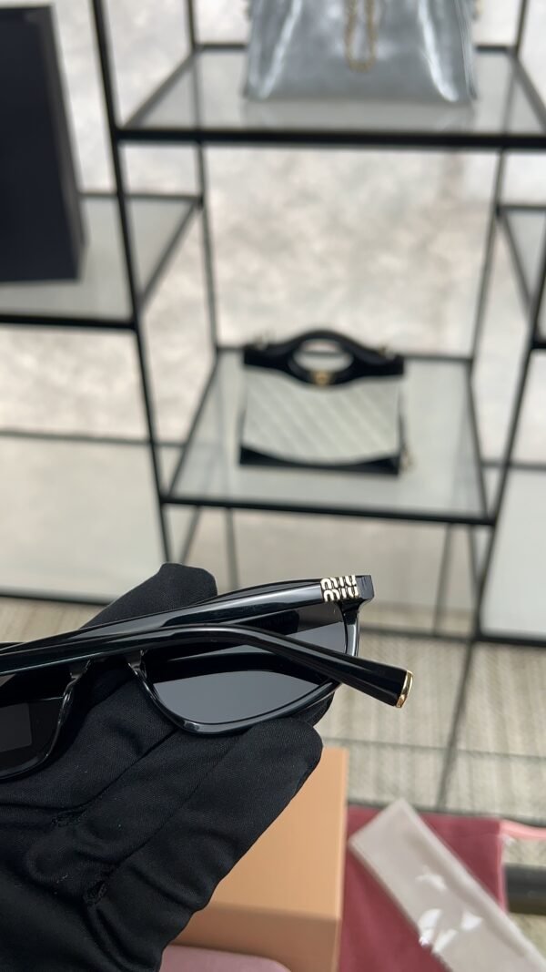 MiuMiu MU A06S  Sunglasses