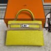 Hermès Mini Kelly 20 Jaune de Naples/Beton Chevre With Silver Hardware