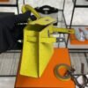 Hermès Mini Kelly 20 Jaune de Naples/Beton Chevre With Silver Hardware