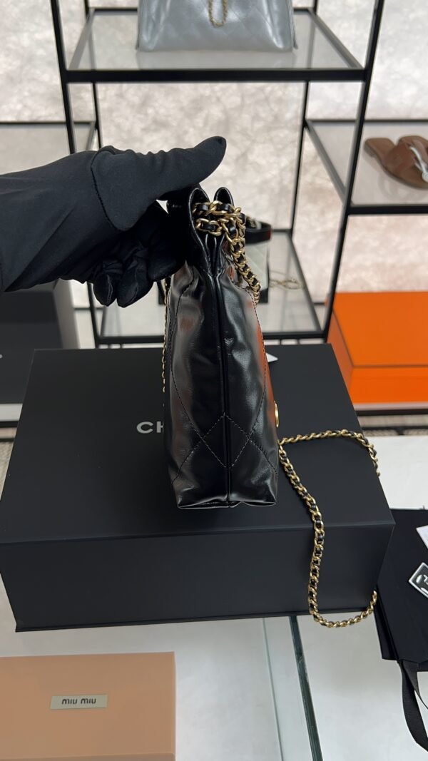 CHANEL 22 Mini Handbag Shiny Calfskin & Gold-Tone Metal Black