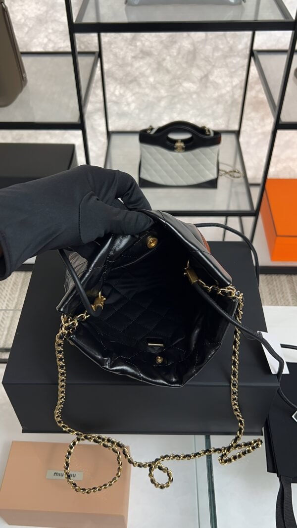CHANEL 22 Mini Handbag Shiny Calfskin & Gold-Tone Metal Black