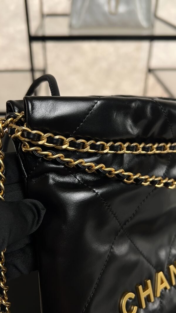 CHANEL 22 Mini Handbag Shiny Calfskin & Gold-Tone Metal Black