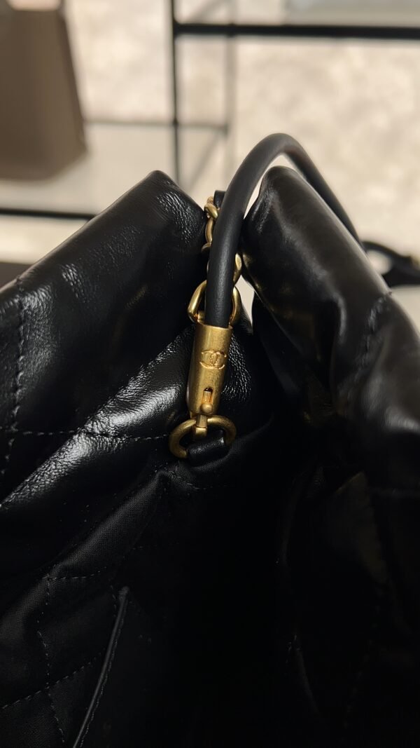 CHANEL 22 Mini Handbag Shiny Calfskin & Gold-Tone Metal Black