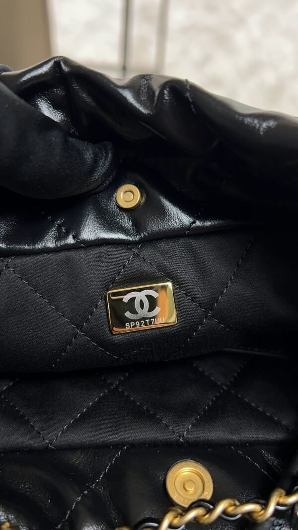 CHANEL 22 Mini Handbag Shiny Calfskin & Gold-Tone Metal Black