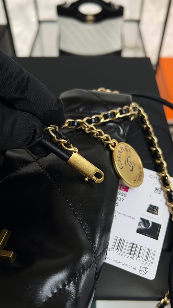 CHANEL 22 Mini Handbag Shiny Calfskin & Gold-Tone Metal Black