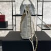 CHANEL 22 Mini Handbag Shiny Calfskin & Gold-Tone Metal White