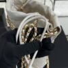 CHANEL 22 Mini Handbag Shiny Calfskin & Gold-Tone Metal White