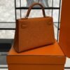 Hermès Mini Kelly 20 in Orange