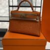 Hermès Mini Kelly 20 in Orange