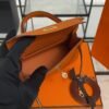 Hermès Mini Kelly 20 in Orange