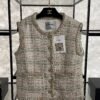 Chanel La Petite Veste Noire tweed blazer