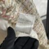 Chanel La Petite Veste Noire tweed blazer