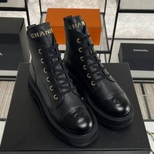Chanel Grained Calfskin Shiny Calfskin CC Lace Up Combat Boots  Black