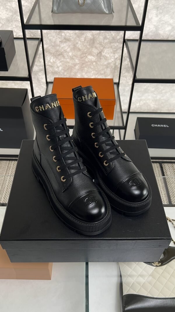 Chanel Grained Calfskin Shiny Calfskin CC Lace Up Combat Boots  Black