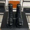Chanel Grained Calfskin Shiny Calfskin CC Lace Up Combat Boots  Black