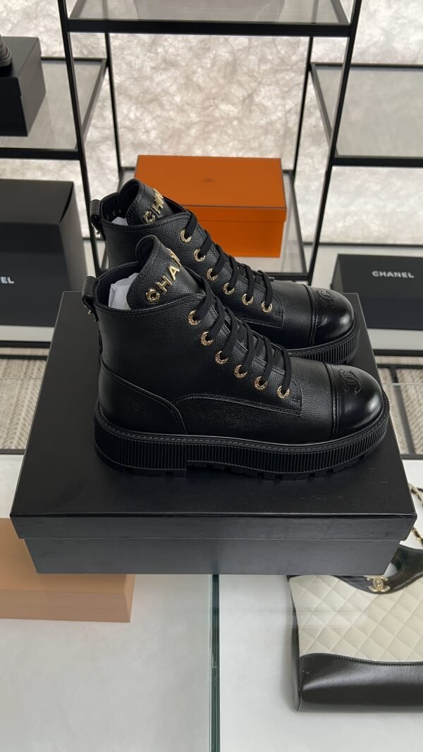 Chanel Grained Calfskin Shiny Calfskin CC Lace Up Combat Boots  Black