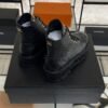 Chanel Grained Calfskin Shiny Calfskin CC Lace Up Combat Boots  Black