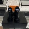 Chanel Grained Calfskin Shiny Calfskin CC Lace Up Combat Boots  Black
