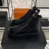 Chanel Grained Calfskin Shiny Calfskin CC Lace Up Combat Boots  Black