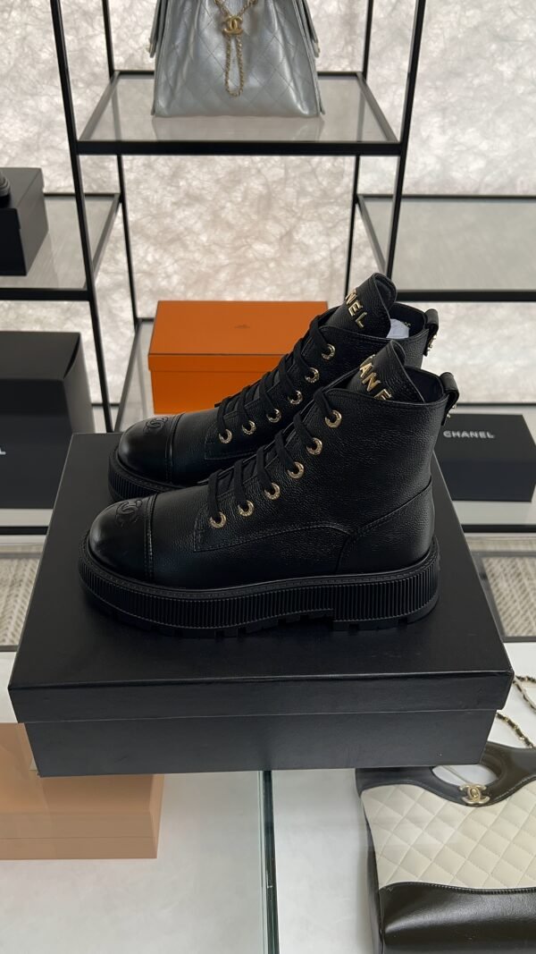 Chanel Grained Calfskin Shiny Calfskin CC Lace Up Combat Boots  Black