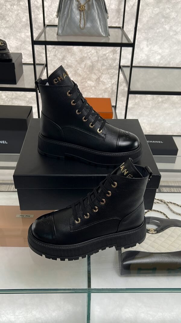 Chanel Grained Calfskin Shiny Calfskin CC Lace Up Combat Boots  Black