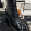 Chanel Grained Calfskin Shiny Calfskin CC Lace Up Combat Boots  Black