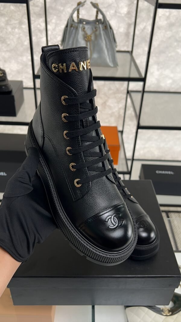 Chanel Grained Calfskin Shiny Calfskin CC Lace Up Combat Boots  Black