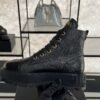 Chanel Grained Calfskin Shiny Calfskin CC Lace Up Combat Boots  Black