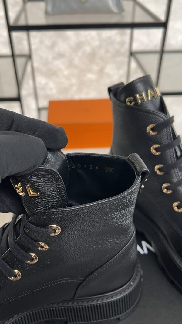 Chanel Grained Calfskin Shiny Calfskin CC Lace Up Combat Boots  Black