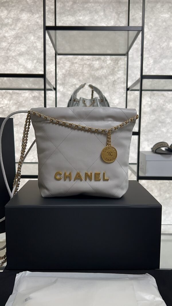 CHANEL 22 Mini Handbag Shiny Calfskin & Gold-Tone Metal Light gray