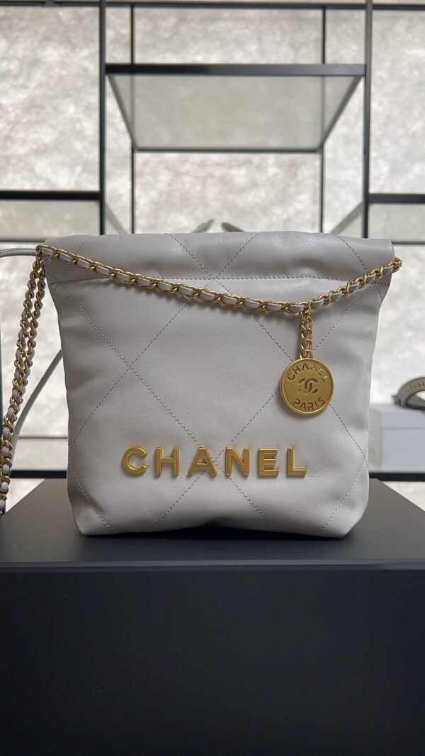 CHANEL 22 Mini Handbag Shiny Calfskin & Gold-Tone Metal Light gray