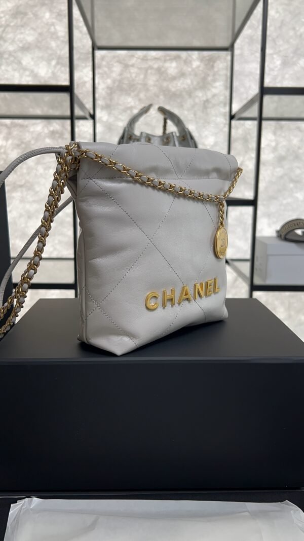 CHANEL 22 Mini Handbag Shiny Calfskin & Gold-Tone Metal Light gray