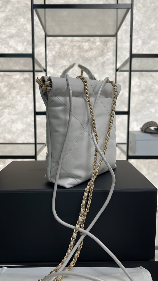 CHANEL 22 Mini Handbag Shiny Calfskin & Gold-Tone Metal Light gray