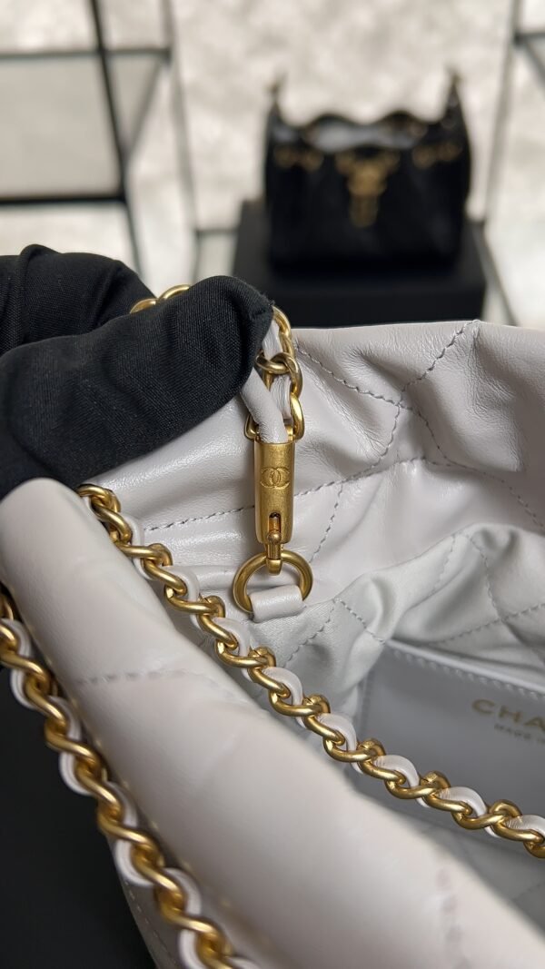 CHANEL 22 Mini Handbag Shiny Calfskin & Gold-Tone Metal Light gray