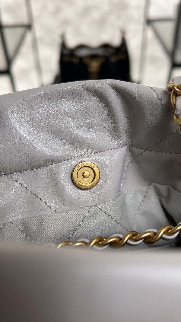 CHANEL 22 Mini Handbag Shiny Calfskin & Gold-Tone Metal Light gray