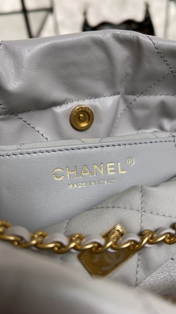 CHANEL 22 Mini Handbag Shiny Calfskin & Gold-Tone Metal Light gray