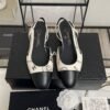 Chanel Printed Lambskin Cap Toe CC Slingback Pumps  Black White