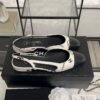 Chanel Printed Lambskin Cap Toe CC Slingback Pumps  Black White