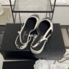 Chanel Printed Lambskin Cap Toe CC Slingback Pumps  Black White