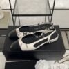 Chanel Printed Lambskin Cap Toe CC Slingback Pumps  Black White
