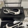 Chanel Printed Lambskin Cap Toe CC Slingback Pumps  Black White