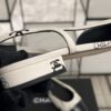 Chanel Printed Lambskin Cap Toe CC Slingback Pumps  Black White