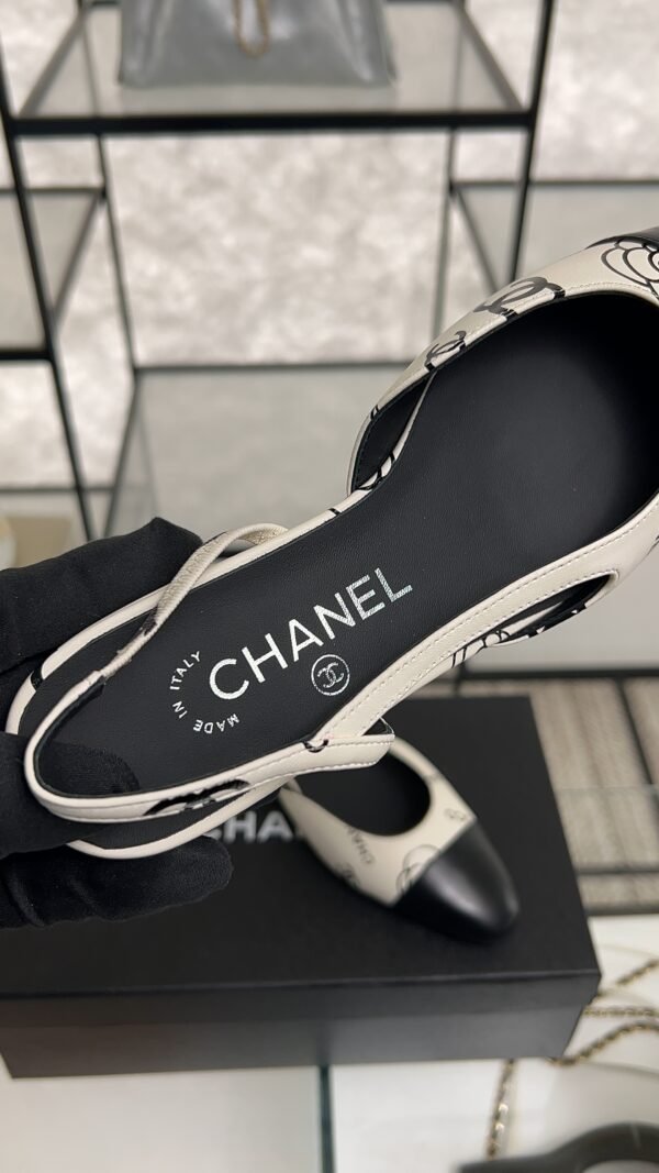 Chanel Printed Lambskin Cap Toe CC Slingback Pumps  Black White
