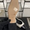 Chanel Printed Lambskin Cap Toe CC Slingback Pumps  Black White