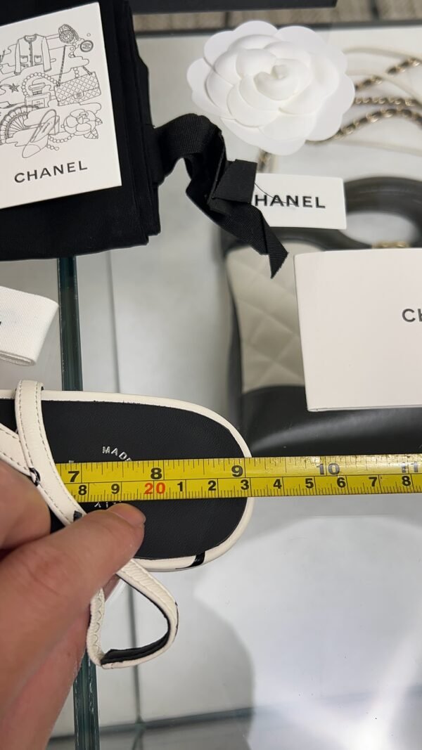 Chanel Printed Lambskin Cap Toe CC Slingback Pumps  Black White