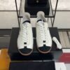 Chanel Calfskin Embossed Suede Sneakers  White Black