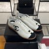 Chanel Calfskin Embossed Suede Sneakers  White Black