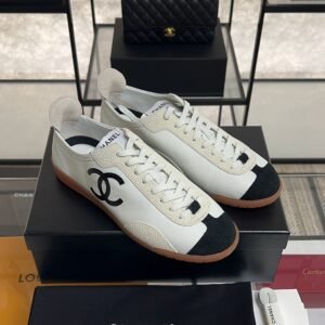 Chanel Calfskin Embossed Suede Sneakers  White Black