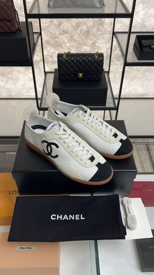 Chanel Calfskin Embossed Suede Sneakers  White Black