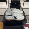 Chanel Calfskin Embossed Suede Sneakers  White Black